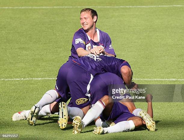 Steven McGarry of the Glory looks on after players celebrate a goal scored by Andrija Jukic during the round 25 A-League match between the Perth...