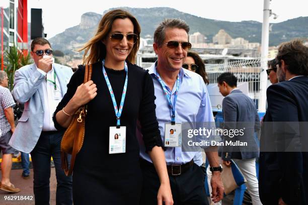 Actor Hugh Grant and his wife, TV producer Anna Eberstein walk in the Paddock before the Monaco Formula One Grand Prix at Circuit de Monaco on May...