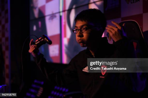 Naoki Sugimura aka SOFIA celebrates after defeating Masato Ohnishi aka Alto during the eSports Asian Games Japan Qualifying at LFS Ikebukuro on May...