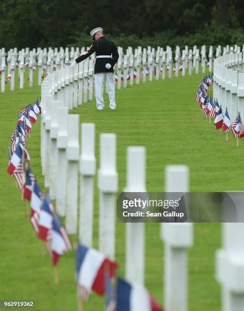These are some of our Marines buried here," said U.S. Marine Sergeant Major Darrell Carver of the 6th Marine Regiment as he walks among the graves of...