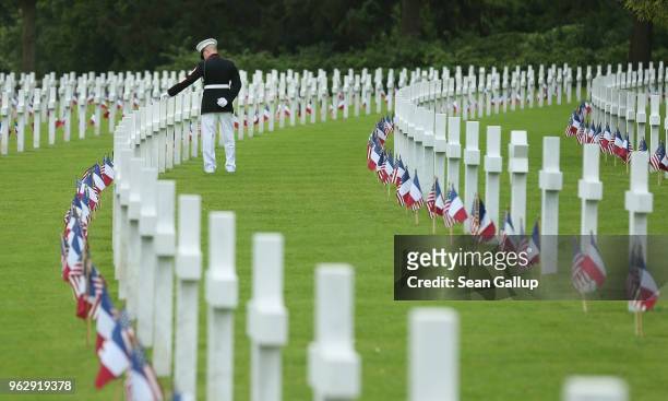 These are some of our Marines buried here," said U.S. Marine Sergeant Major Darrell Carver of the 6th Marine Regiment as he walks among the graves of...