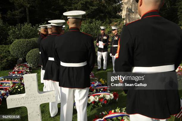 Marines discuss their choreography prior to a ceremony to commemorate the 100th anniversary of the World War I Battle of Belleau Wood on Memorial Day...