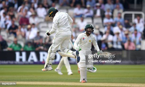 Imam-ul-Haq and Haris Sohail of Pakistan celebrate winning the 1st NatWest Test match at Lord's Cricket Ground on May 27, 2018 in London, England.