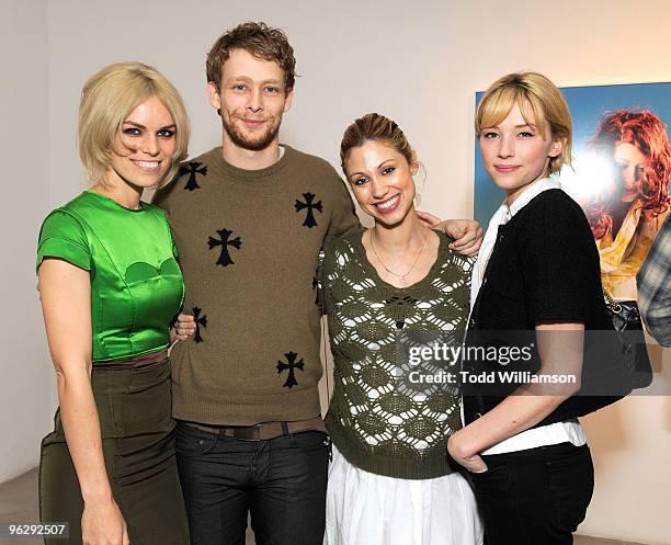 Alex Prager, Johnny Lewis and Hayley Bennett pose at an Artist's Reception for Alex Prager "Week-end" at M+B Gallery on January 30, 2010 in Los...