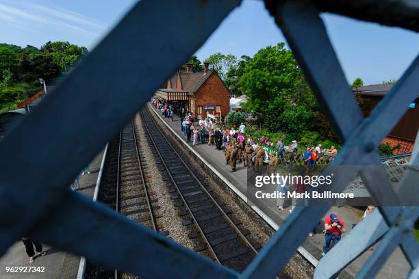 Re-enactors as the cast of the hit TV Series Dad's Army salute a train stopping at the platform on May 27, 2018 in Weybourne, England. The North...