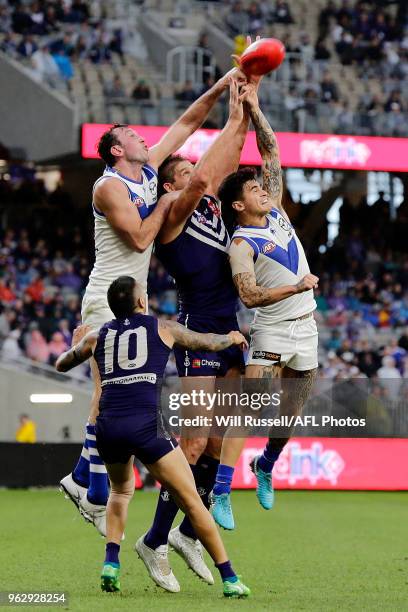 Todd Goldstein of the Kangaroos spoils during the round 10 AFL match between the Fremantle Dockers and the North Melbourne Kangaroos at Optus Stadium...