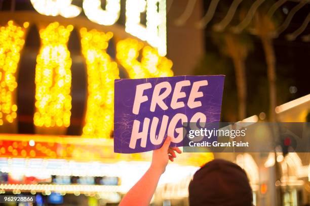 close up of sign held by man making tips on vegas strip. - las vegas crazy stock pictures, royalty-free photos & images