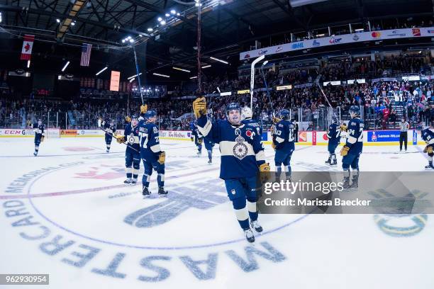 Sam Steel of the Regina Pats raises his stick and salutes fans after a game 1 win against the Hamilton Bulldogs at Brandt Centre - Evraz Place on May...