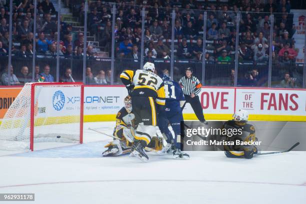 Cameron Hebig of Regina Pats scores a goal on Kaden Fulcher of Hamilton Bulldogs at Brandt Centre - Evraz Place on May 18, 2018 in Regina, Canada.