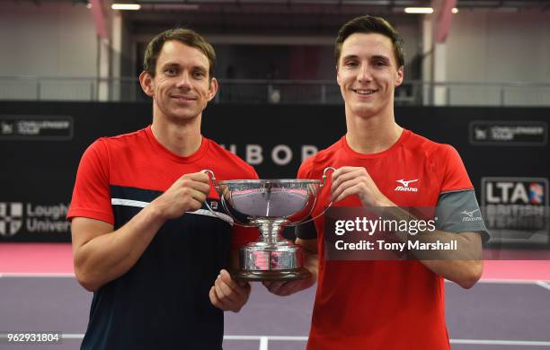 Frederik Nielsen of Denmark and Joe Salisbury of Great Britain pose with the Loughborough Trophy after winning the Mens Doubles Final against Luke...