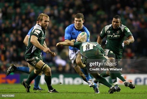 Gordon D'Arcy of Leinster is tackled by Paul Hodgson of London Irish during the Heineken Cup Pool Six game between London Irish and Leinster at...