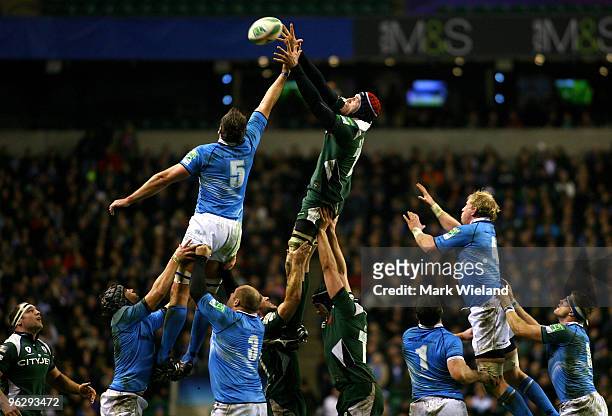Nick Kennedy of London Irish jumps for the lineout ball with Nathan Hines of Leinster during the Heineken Cup Pool Six game between London Irish and...