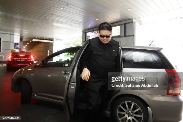 Kim Jong Un impersonator, Howard X arrives at One Fullerton on May 27, 2018 in Singapore. The proposed North Korea-United States summit between U.S....