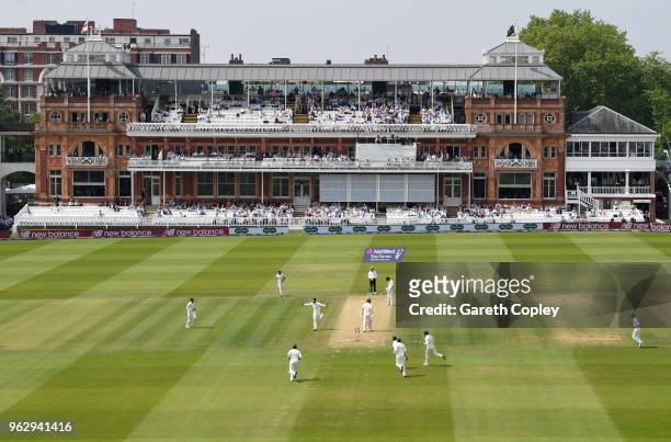 Mohammad Amir of Pakistan celebrates dismissing Mark Wood of England during day four of the 1st NatWest Test match at Lord's Cricket Ground on May...