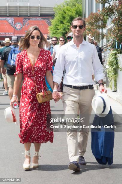 Pippa Middleton and James Matthews are seen in Roland Garros on May 27, 2018 in Paris, France.