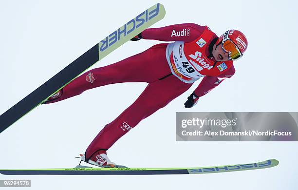 Eric Frenzel of Germany competes in the Gundersen Ski Jumping HS 100 event during day two of the FIS Nordic Combined World Cup on January 31, 2010 in...