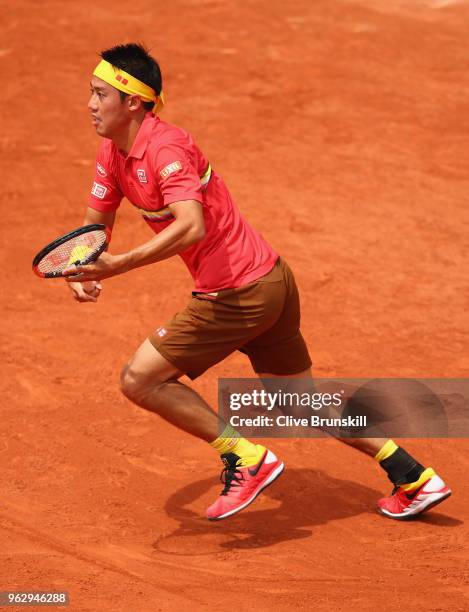 Kei Nishikori of Japan in action against Maxime Janvier of France in their first round mens singles match on day one of the French Open at Roland...