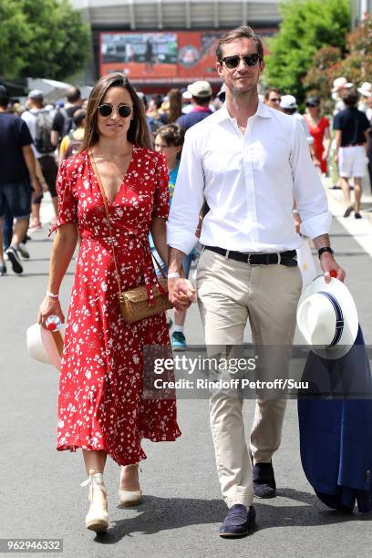 Pippa Middleton and her husband James Matthews are seen attending the french open at Roland Garros on May 27, 2018 in Paris, France.