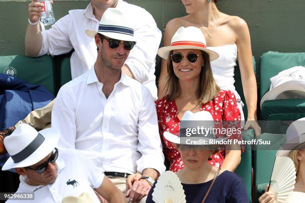 Pippa Middleton and her husband James Matthews are seen attending the french open at Roland Garros on May 27, 2018 in Paris, France.