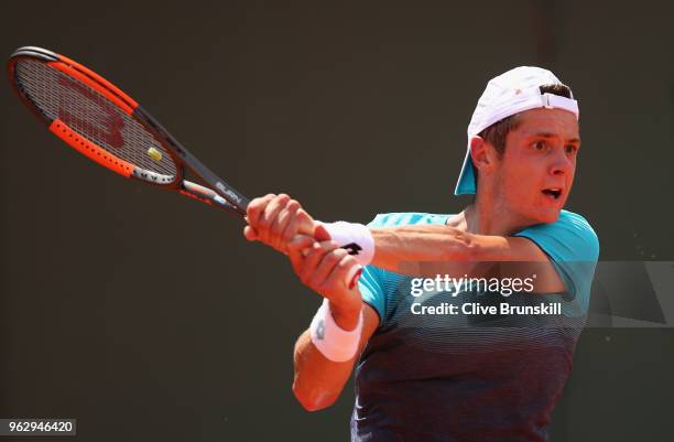 Maxime Janvier of France in action against Kei Nishikori of Japan in their first round mens singles match on day one of the French Open at Roland...