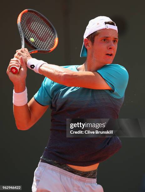 Maxime Janvier of France in action against Kei Nishikori of Japan in their first round mens singles match on day one of the French Open at Roland...