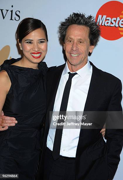 Producer Brian Grazer and Chau-Giang Thi Nguyen arrive at the 2010 Pre-Grammy Gala & Salute To Industry Icons at Beverly Hills Hilton on January 30,...