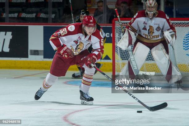 Noah Dobson of Acadie-Bathurst Titan skates with the puck against the Hamilton Bulldogs at Brandt Centre - Evraz Place on May 22, 2018 in Regina,...