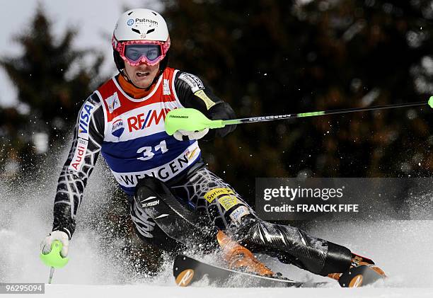 Ted Ligety clears a gate during the 2nd round of the FIS World Cup Men's Super combined-Slalom in Wengen on January 15, 2010. AFP PHOTO / FRANCK FIFE