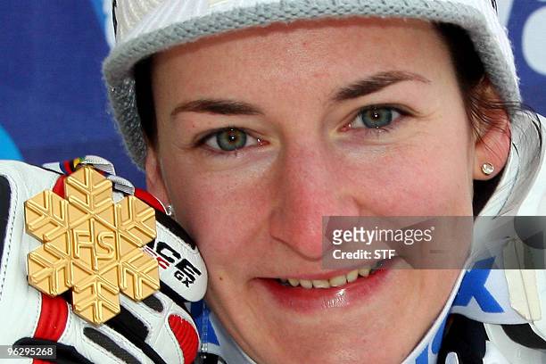 Austrian Kathrin Zettel poses with her gold medal after the women's combined slalom at the World Ski Championships on February 6, 2009 in Val...