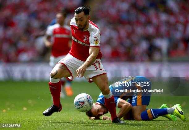 Richie Towell of Rotherham United evades Alex Rodman of Shrewsbury Town during the Sky Bet League One Play Off Final between Rotherham United and...