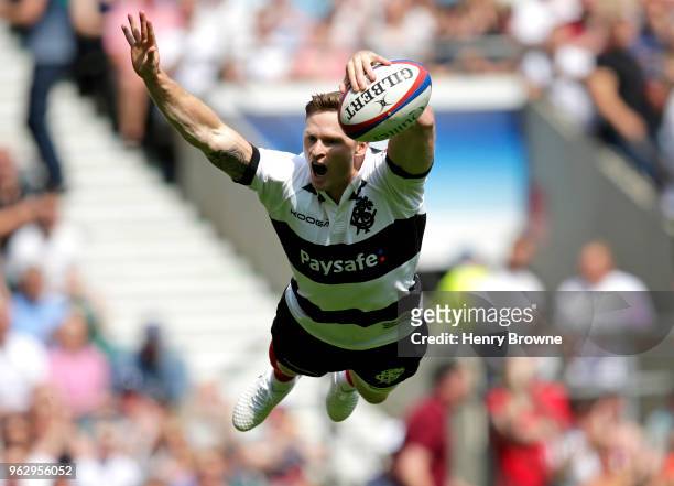 Chris Ashton of the Barbarians scores their first try during the Quilter Cup match between England and Barbarians at Twickenham Stadium on May 27,...
