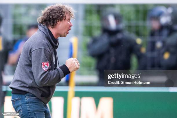 Head coach Stefan Kraemer of Uerdingen reacts in front of supporters of his team during the Third League Playoff Leg 2 match between SV Waldhof...