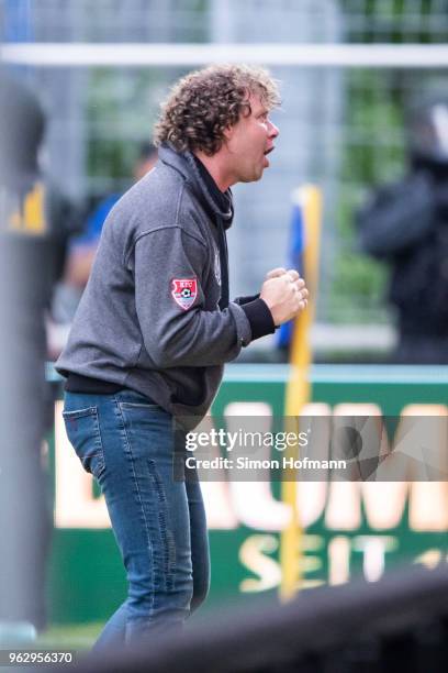 Head coach Stefan Kraemer of Uerdingen reacts in front of supporters of his team during the Third League Playoff Leg 2 match between SV Waldhof...