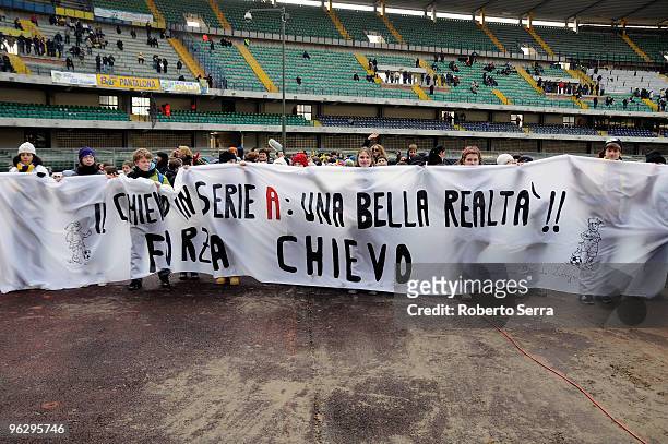 Supporters of Chievo Verona in action during the Serie A match between Chievo and Bologna at Stadio Marc'Antonio Bentegodi on January 31, 2010 in...