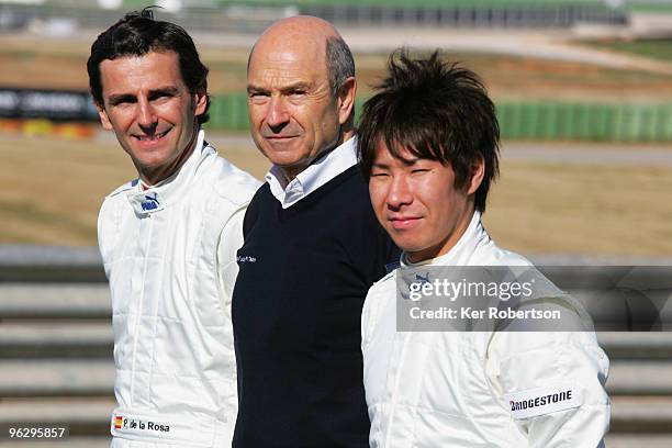 Pedro de la Rosa of Spain, BMW Sauber team owner Peter Sauber and Kamui Kobayashi of Japan attend the unveiling of the new BMW Sauber C29 at the...