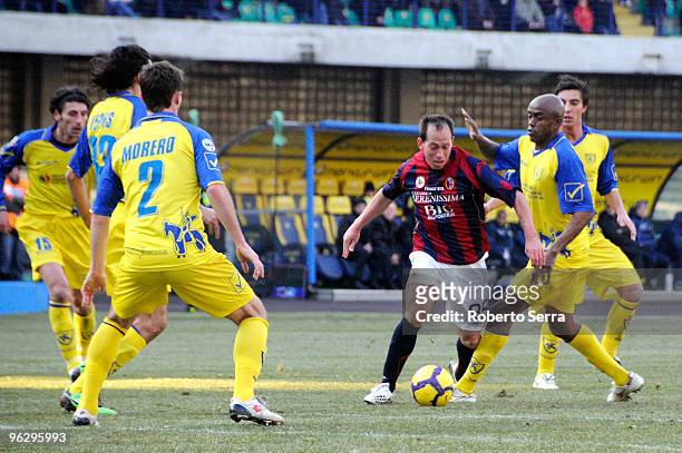 Martins Bolzan Adailton of Bologna competes with Siqueira Luciano of Chievo Verona during the Serie A match between Chievo and Bologna at Stadio...