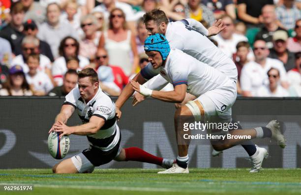 Chris Ashton of the Barbarians scores their second try during the Quilter Cup match between England and Barbarians at Twickenham Stadium on May 27,...