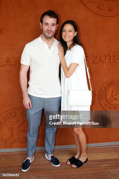 Actor Yaniss Lespert and his companion Betina Orsetti attend the 2018 French Open - Day One at Roland Garros on May 27, 2018 in Paris, France.