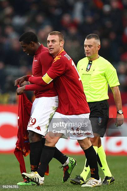 Stefano Okaka, Daniele De Rossi of AS Roma celebrate the second goal during the Serie A match between Roma and Siena at Stadio Olimpico on January...