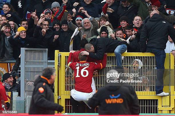 Stefano Okaka , Daniele De Rossi of AS Roma and his fans celebrate the second goal during the Serie A match between Roma and Siena at Stadio Olimpico...