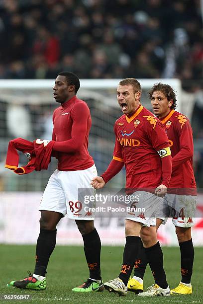 Stefano Okaka , Daniele De Rossi and Alessio Cerci of AS Roma celebrate the second goal during the Serie A match between Roma and Siena at Stadio...