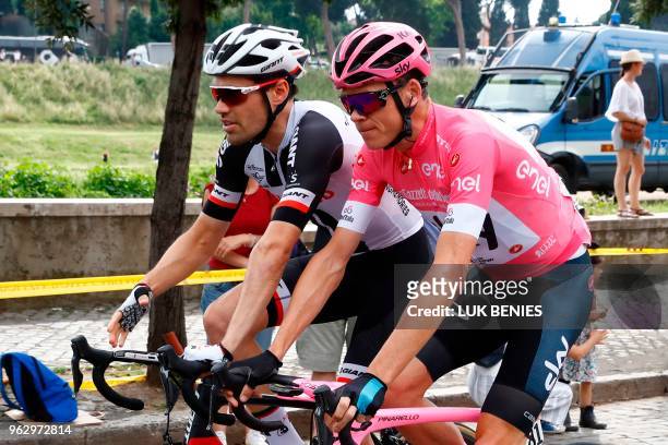 Pink jersey Britain's rider of team Sky Christopher Froome rides with Netherlands' rider of team Sunweb Tom Dumoulin during the 21st and last stage...