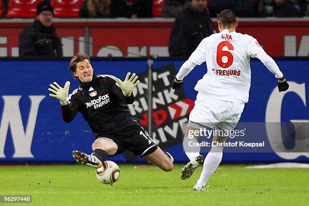 Rene Adler of Leverkusen saves a shot of Du-Ri Cha of Freiburg during the Bundesliga match between Bayer Leverkusen and SC Freiburg at the BayArena...