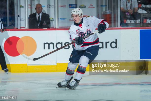 Cale Fleury of Regina Pats passes the puck against the Acadie-Bathurst Titan at Brandt Centre - Evraz Place on May 20, 2018 in Regina, Canada.