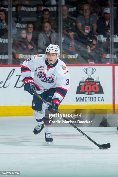 Libor Hajek of Regina Pats passes the puck against the Acadie-Bathurst Titan at Brandt Centre - Evraz Place on May 20, 2018 in Regina, Canada.