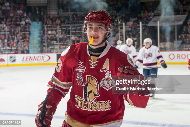 Noah Dobson of Acadie-Bathurst Titan skates to the bench to celebrate a goal against the Regina Pats at Brandt Centre - Evraz Place on May 20, 2018...