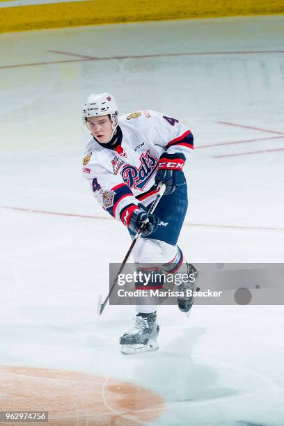 Cale Fleury of Regina Pats passes the puck against the Acadie-Bathurst Titan at Brandt Centre - Evraz Place on May 20, 2018 in Regina, Canada.