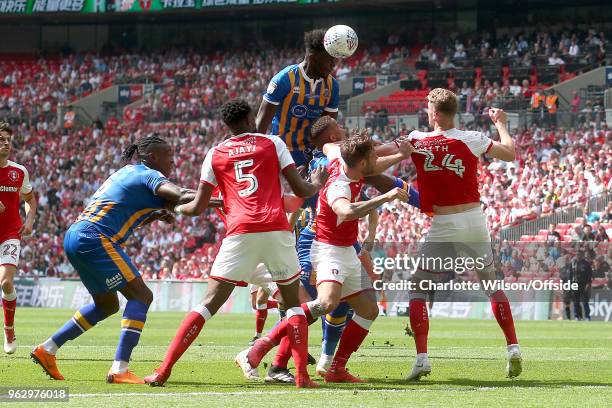 Aristote Nsiala of Shrewsbury wins a header but sends it wide during the Sky Bet League One Play Off Semi Final:Second Leg between Rotherham United...