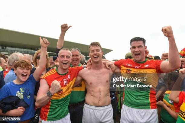 Offaly , Ireland - 27 May 2018; Carlow players from left Cian Lawler, Paul Broderick and team captain John Murphy celebrate after the Leinster GAA...