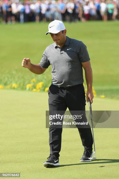 Francesco Molinari of Italy celebrates his victory on the 18th green during the final round of the BMW PGA Championship at Wentworth on May 27, 2018...